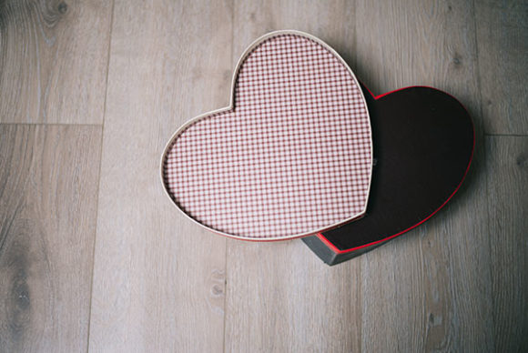 Download Striped Heart Box on a Wooden Surface - Art Collection